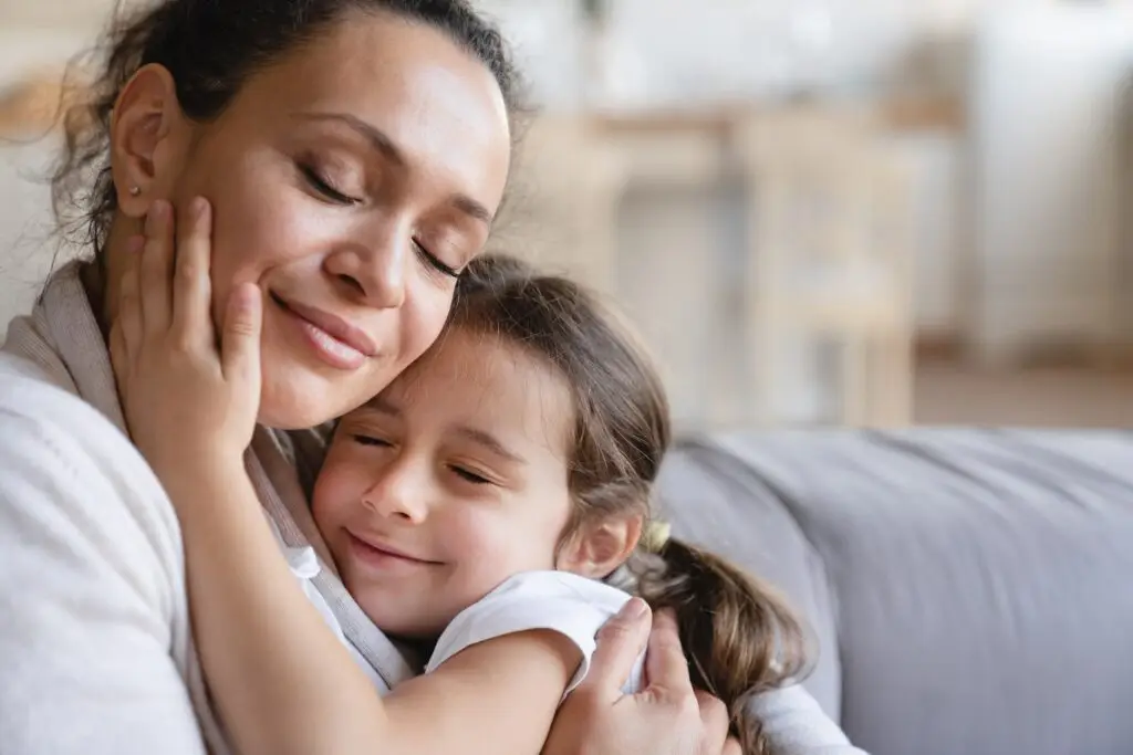 mother-and-daughter-embracing-with-eyes-closed-expressing-love-and-care-happy-mother-s-day-.jpg