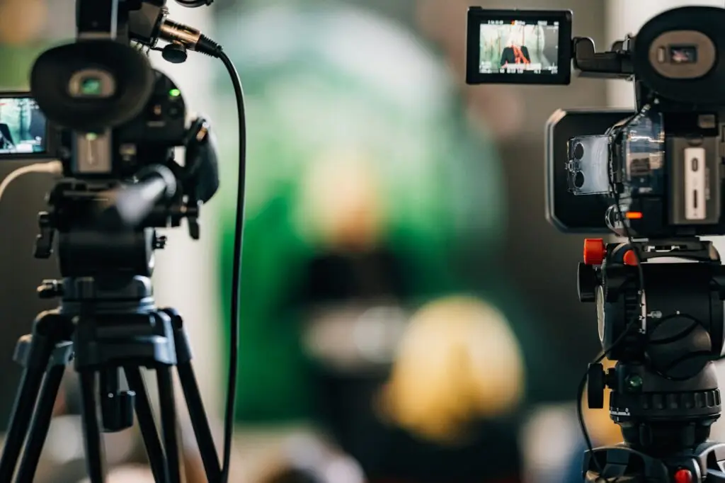 Cameras at a Live Media Conference.